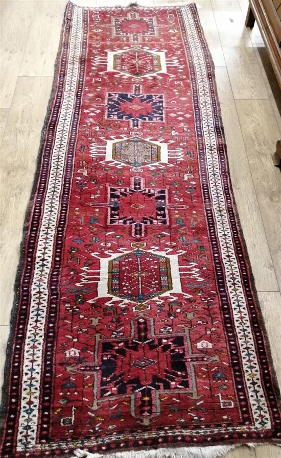 A Heriz runner 250 x 90cm approx.